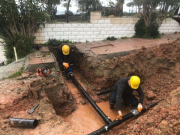 Ayvalıkta BASKİ ekipleri zor kış koşullarında çalışmalarını sürdürüyor